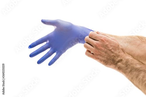 blue rubber glove on a light background