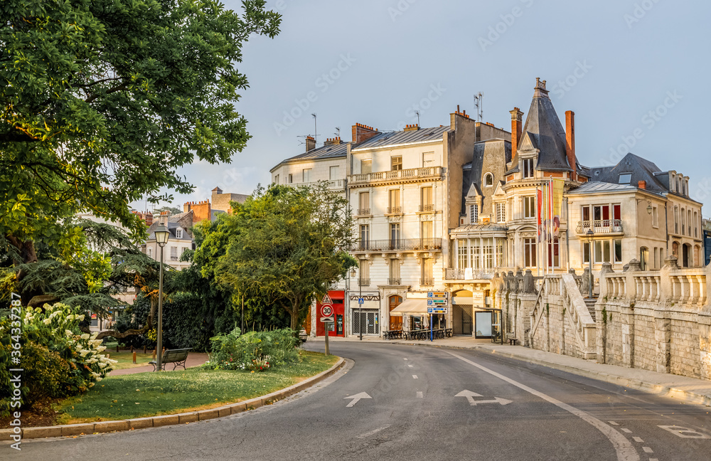 Blois, France, Loire Valley. Empty road in the old town between historical buildings and city park. 