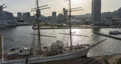 神戸のタイムラプス / 停泊する帆船と神戸の夕景 photo