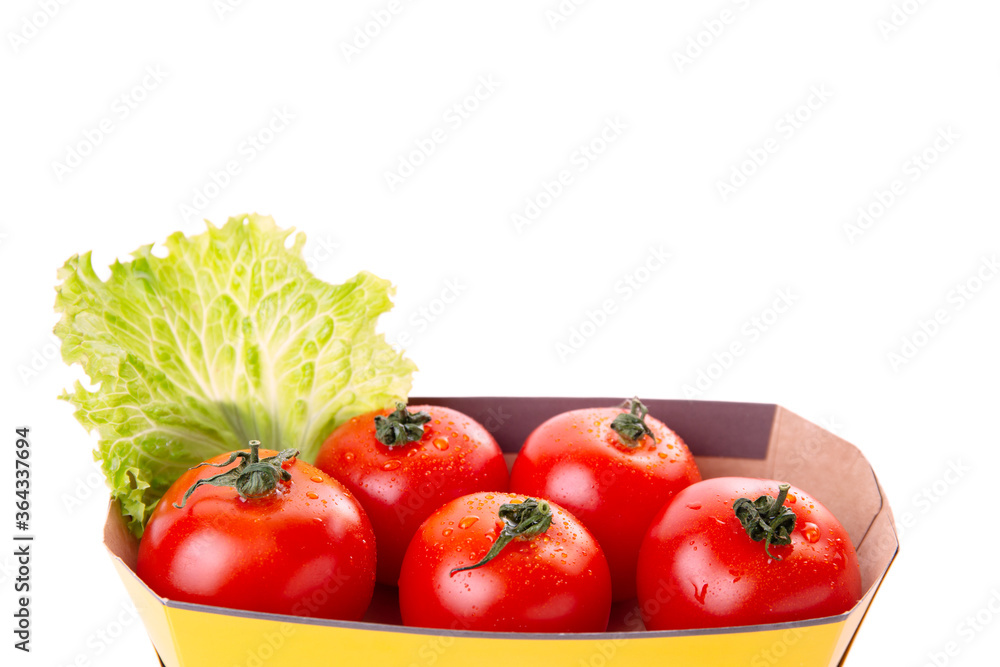 Fresh healthy tomatoes in an eco bag isolated on a white background. Shopping of organic and vegetarian food. Zero waste, eco friendly or plastic free lifestyle concept. Copy space. Fresh healthy tomatoes in an eco bag isolated on a white background. Shopping of organic and vegetarian food. Zero waste, eco friendly or plastic free lifestyle concept. Copy space.