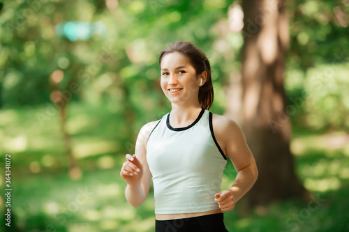 girl goes in for sports in the park of europe