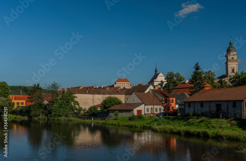 View from road bridge over Jihlava river in Dolni Kounice village in summer day
