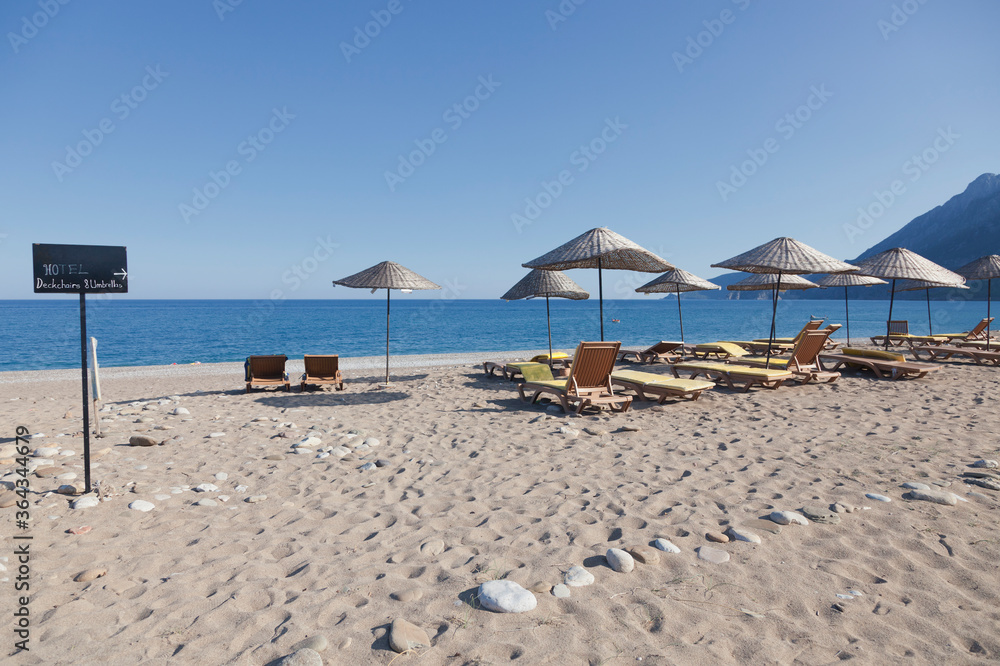 Beach Umbrellas with Sun Loungers on Beach Beach Umbrellas with Sun Loungers on Beach