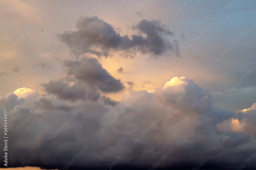 Obraz premium Beautiful sunset sky with clouds. Close-up.