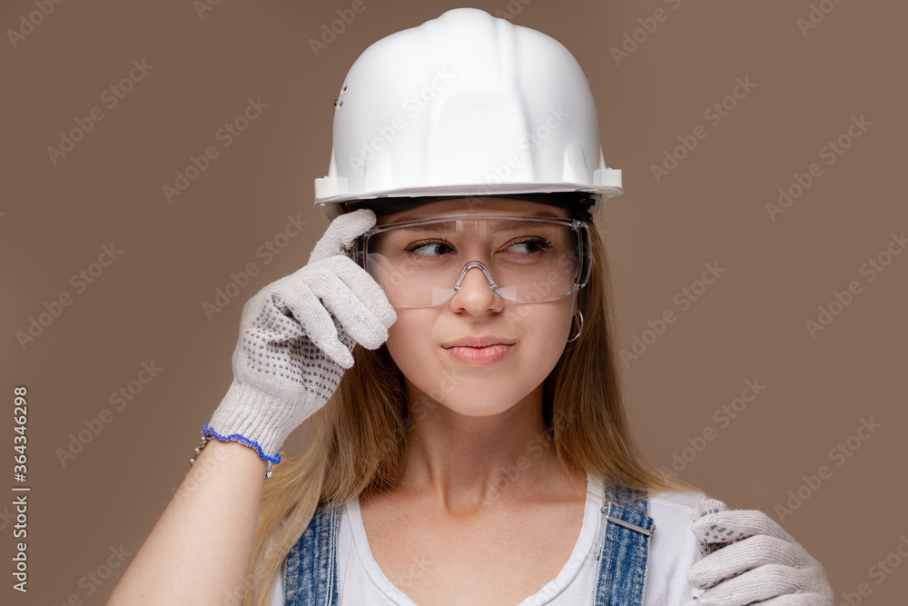 Portrait of attractive architect woman with hard hat, isolated on white background.