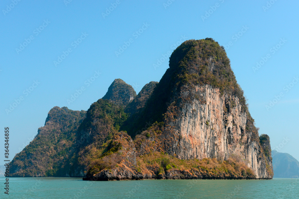 A small picturesque rocky island near the island of Phuket, Thailand