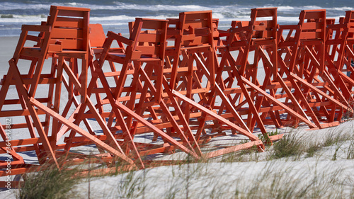 Lifeguard chairs have been collected and assembled together due to the beach being closed to COVID-19 © Tim Davis