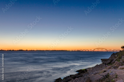 C 2020 F3  or Comet Neowise  rising over the coast in the early morning twilight hours. Fire Island Inlet Bridge - Long Island New York