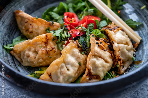 Tasty asian food, homemade deep fried chicken gyoza dumplings