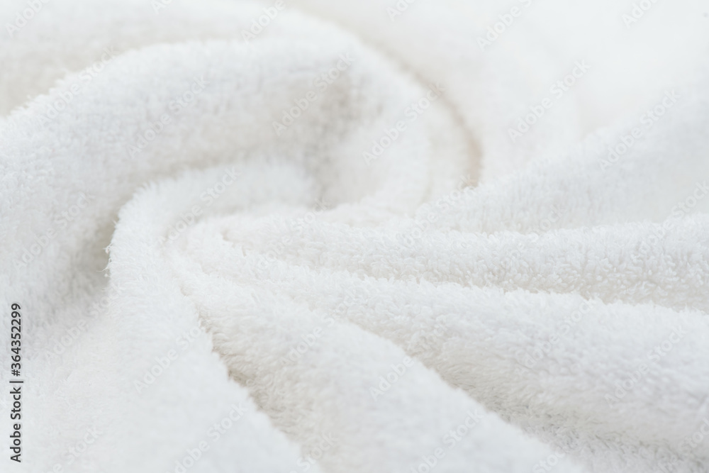 Towel texture closeup. Soft white cotton towel backdrop, fabric background. Terry cloth bath or beach towels. Soft fluffy Textile. Macro, texture Towel texture closeup. Soft white cotton towel backdrop, fabric background. Terry cloth bath or beach towels. Soft fluffy Textile. Macro, texture