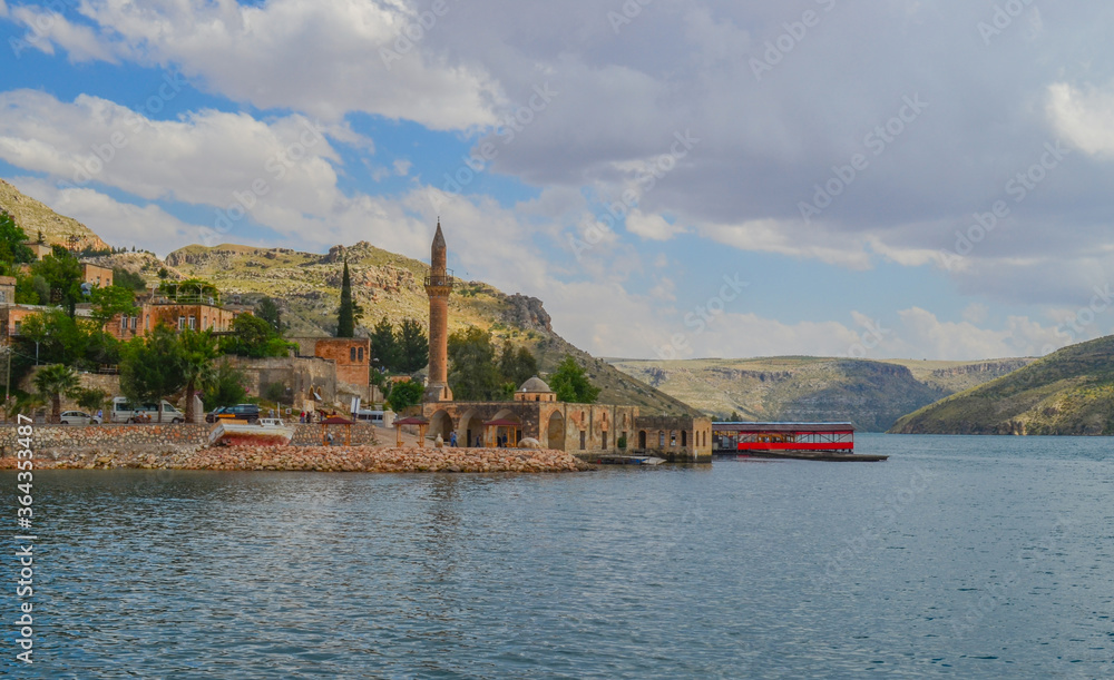 Sanliurfa, Halfeti, blue lake and green trees, hidden paradise, old houses and mosque
