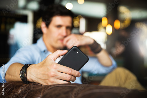 Closeup view of smartphone in male hand