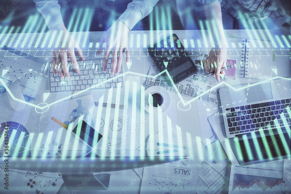 Double exposure of man and woman working together and data theme hologram drawing. Computer background. Top View. Double exposure of man and woman working together and data theme hologram drawing. Computer background. Top View.