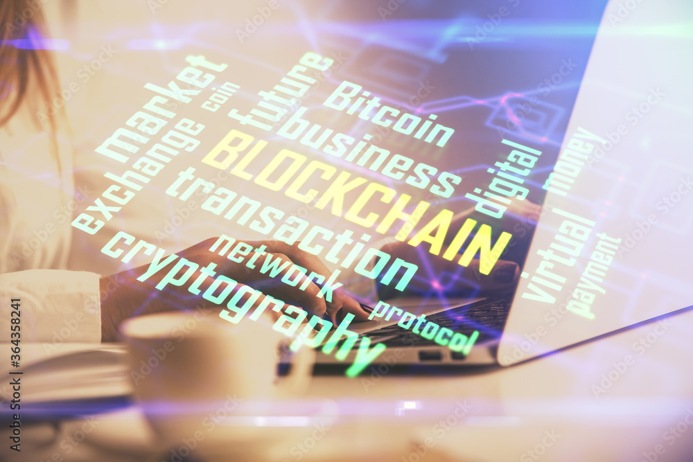 Obraz premium Double exposure of woman hands typing on computer and crypto market theme hologram drawing. Blockchain concept.