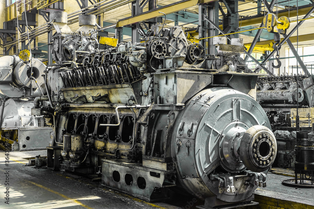 Diesel locomotive engine in a repair depot room