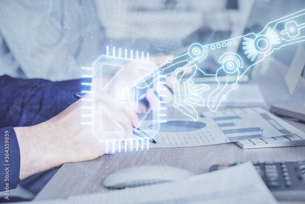 Double exposure of man's hand holding and using a digital device and data theme hologram drawing. Technology concept. Double exposure of man's hand holding and using a digital device and data theme hologram drawing. Technology concept.