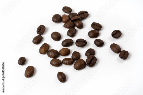 Coffee beans isolated on white background. Brown aromatic arabica