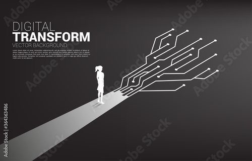 Silhouette of businesswoman standing on the way with dot connect line circuit. concept of digital transformation of business.