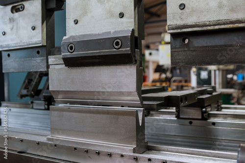 Bending sheet metal with a hydraulic machine at the factory