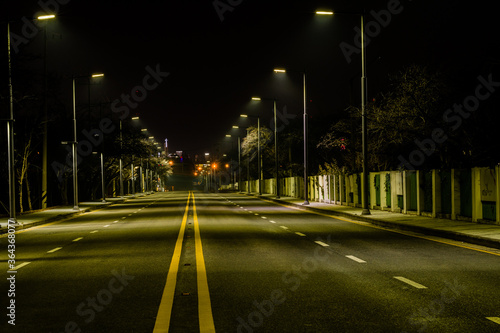 Night photo of empty four lane street