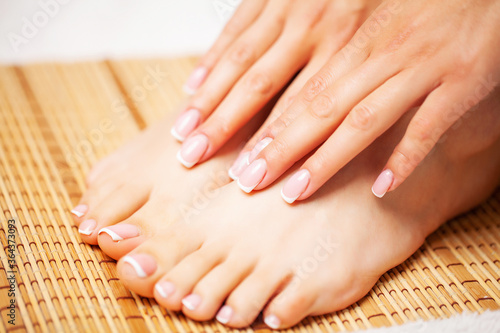 Beautiful legs of a woman with a fresh pedicure