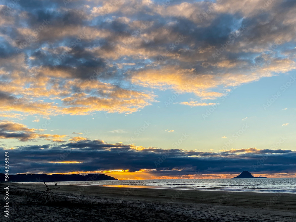 Ohope beach near Whakatane at sunset in New zealand