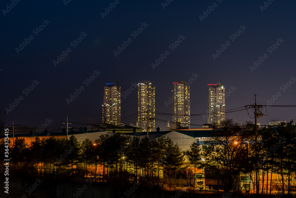 Night view of tall apartment buildings