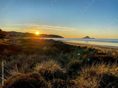 Ohope beach near Whakatane at sunset in New zealand photo