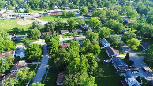 View of Surburban Greencastle Indiana Neighborhood and House - Close Up Dolly Shot photo