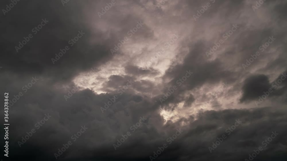 Time lapse 4K 3840x2160 of moving dark clouds in the sky in bad weather day Time lapse 4K 3840x2160 of moving dark clouds in the sky in bad weather day