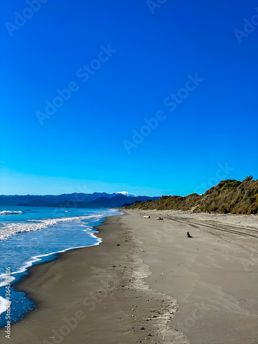 Located at the eastern end of the Bay of Plenty, Opotiki Beach is a popular New Zealand holiday destination photo