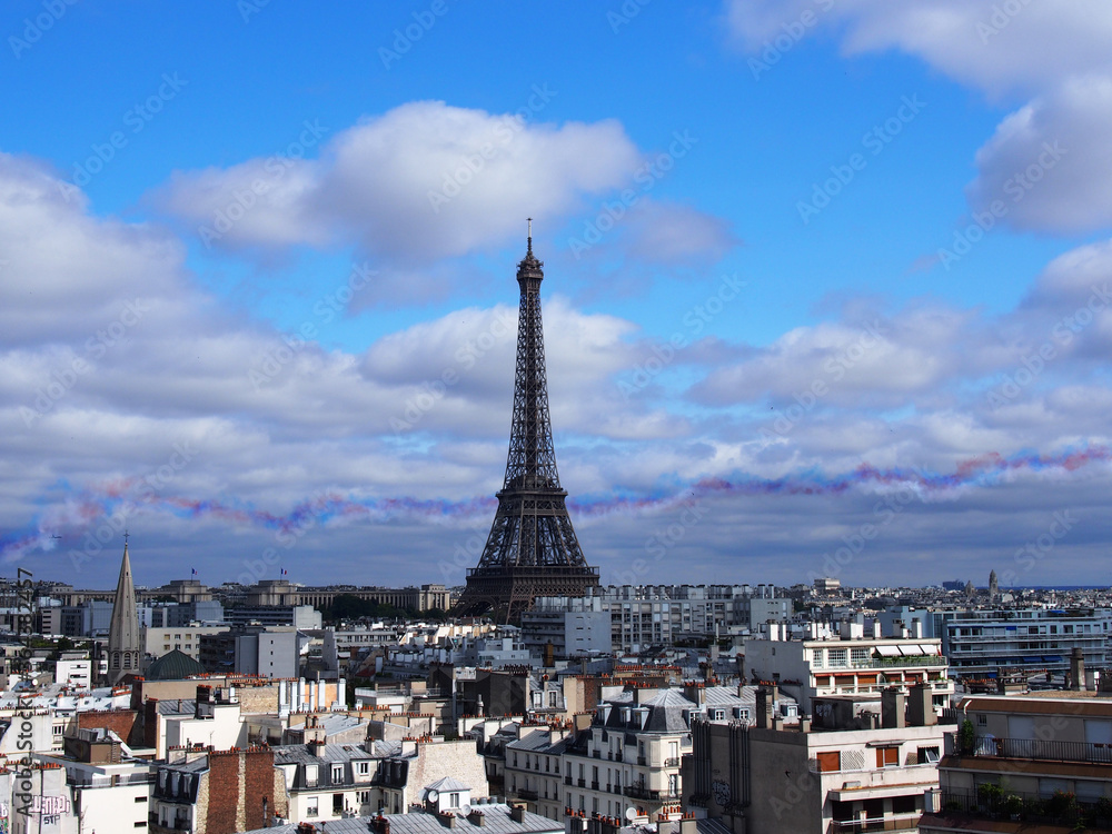 Fototapeta premium Celebrating Bastille Day Air Force and Army demonstration flight in Paris sky.