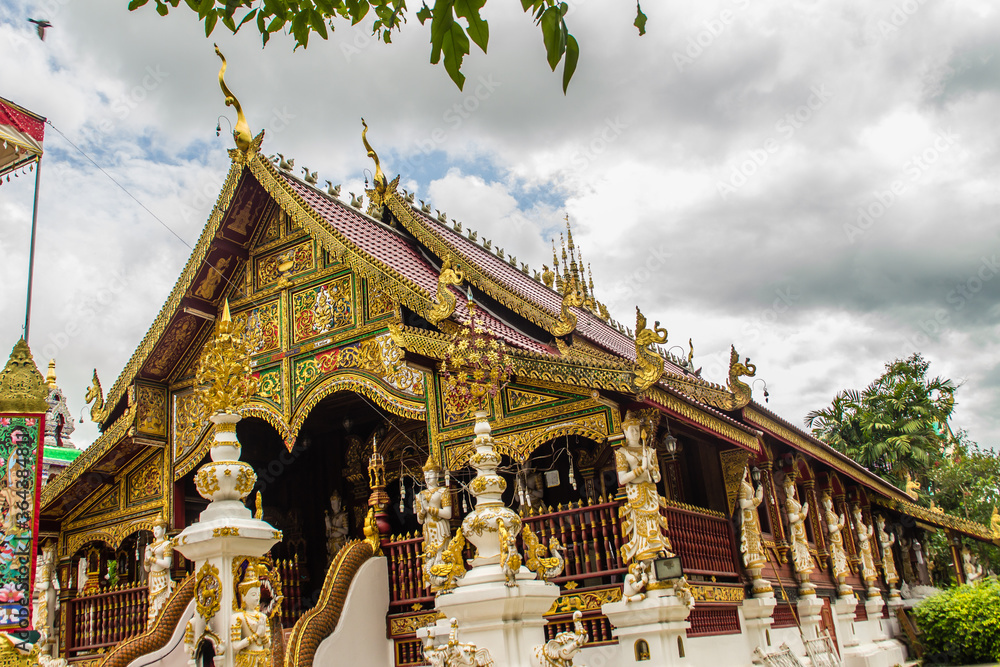 Fototapeta premium Beautiful art, religious places and religious objects in Myanmar mixed with Lanna style at Wat Ming Muang Buddhist temple, Chiang Rai, Thailand. Mixed Lanna and Burmese arts.