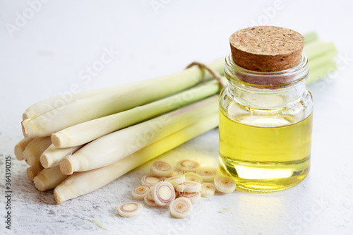 Принти на полотні lemongrass essential oil and fresh lemongrass on the white marble table