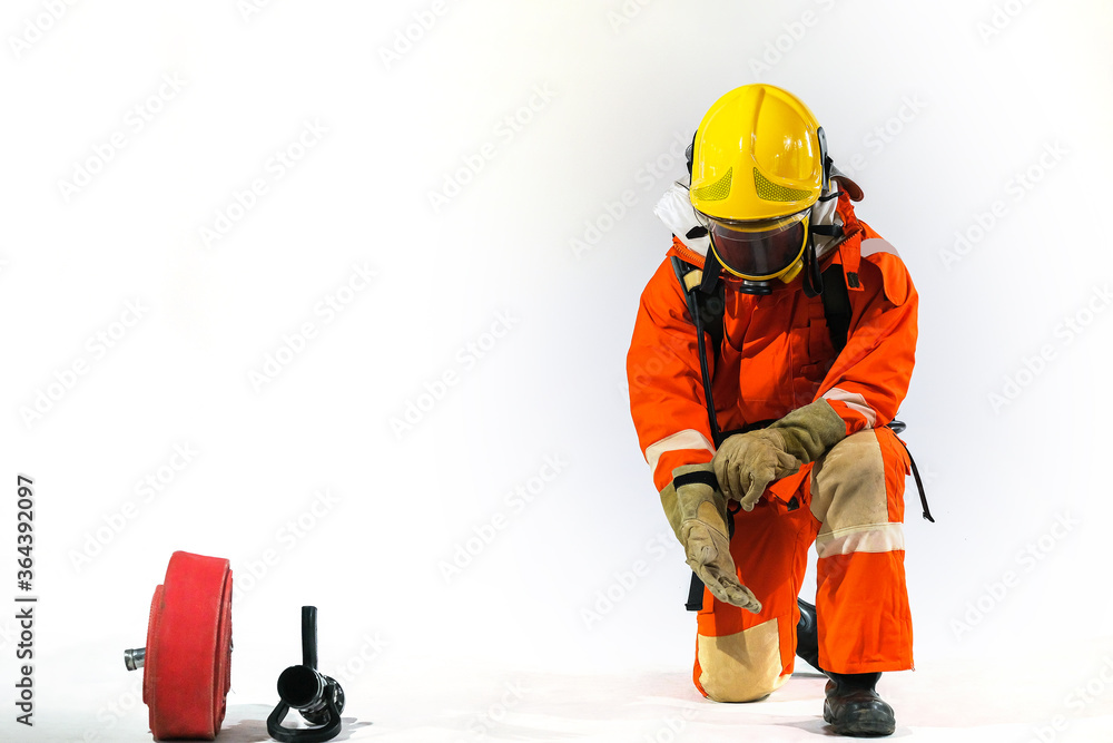 Firefighters wearing firefighting clothing on a white background and Helps to prevent fire Firefighters wearing firefighting clothing on a white background and Helps to prevent fire