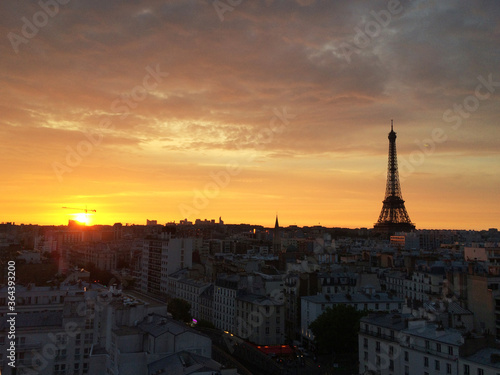 Paris skyline with an impressive Eiffel Tower in the sunrise.