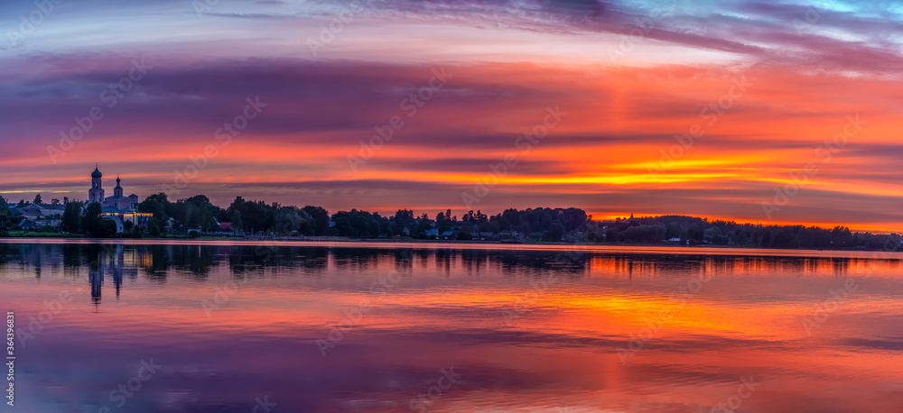 Beautiful summer sunset on Valdai Lake in July.