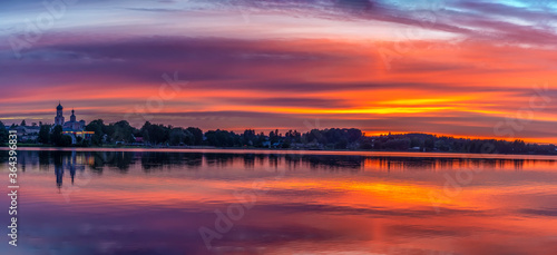 Beautiful summer sunset on Valdai Lake in July.