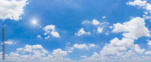 Panorama blue sky and clouds with sun and daylight natural background. © ParinPIX