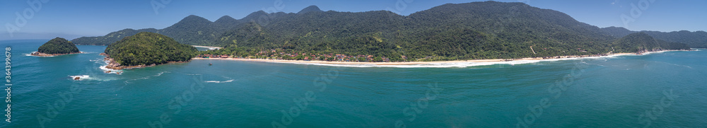 Aerial view panorama to wonderful Green Coast shoreline and mountains covered with Atlantic Forest, Picinguaba, Brazil