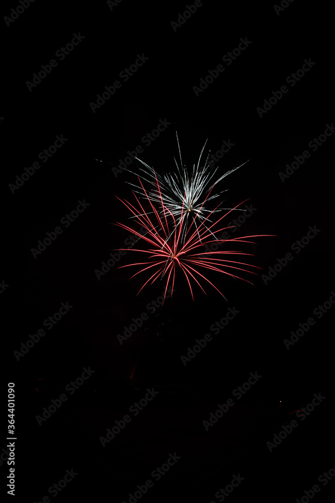 4th of July and new year Fireworks in the night sky. Firework concept background. 4th of July and new year Fireworks in the night sky. Firework concept background.