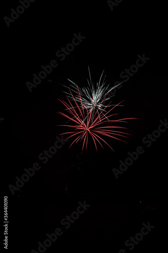 4th of July and new year Fireworks in the night sky. Firework concept background.