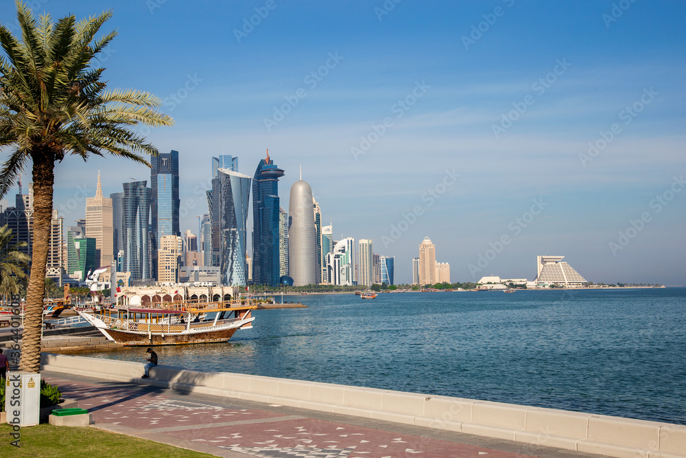 Fototapeta premium Corniche road West Bay Doha, The popular exercise location known for fantastic promenades, water sports, traditional dhow races and more.