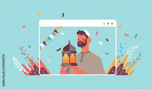 arabic man celebrating online ramadan kareem muslim religion holy month celebration self isolation quarantine concept guy holding lantern web browser window portrait horizontal vector illustration
