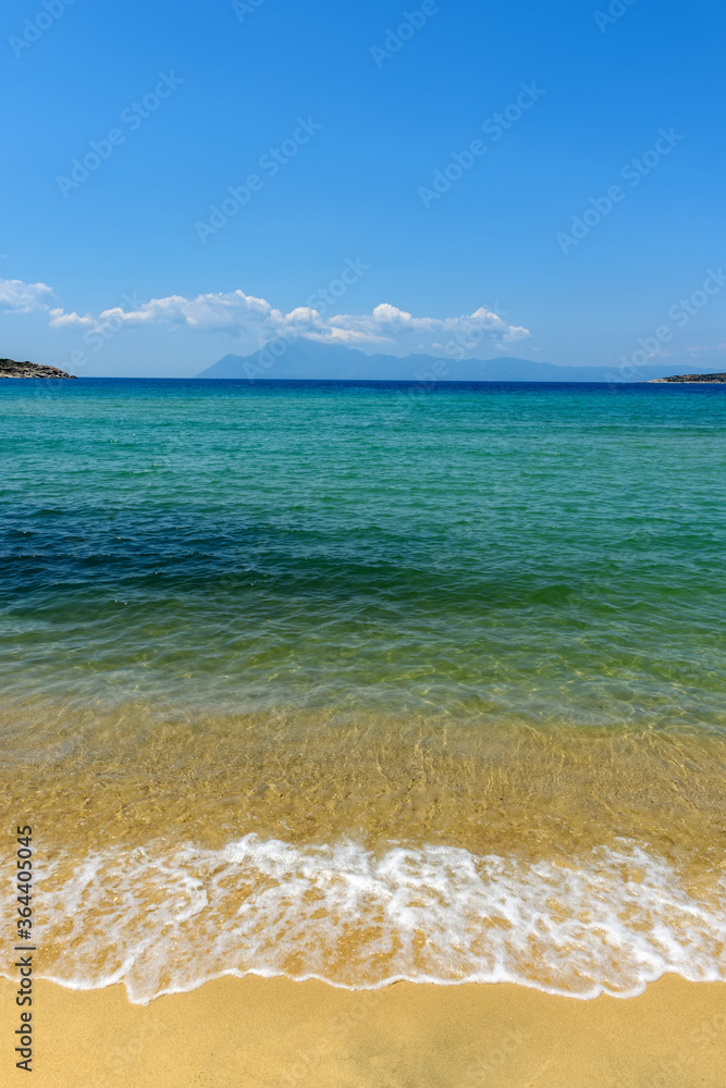 Summer beach background. Sand, sea and sky