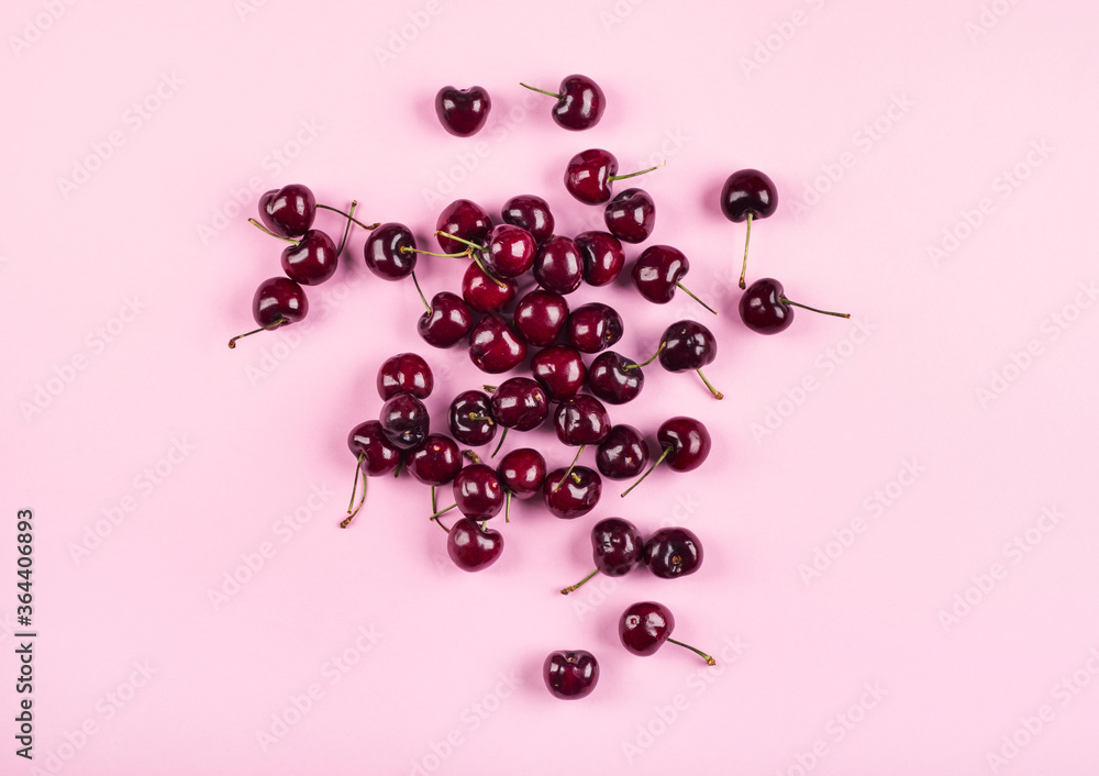 Heap of cherries on pink background. Summer berries Heap of cherries on pink background. Summer berries