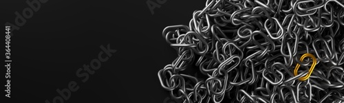 Golden chain element on heap of silver metal chains on dark background with copy space, success, standing out or safety concept