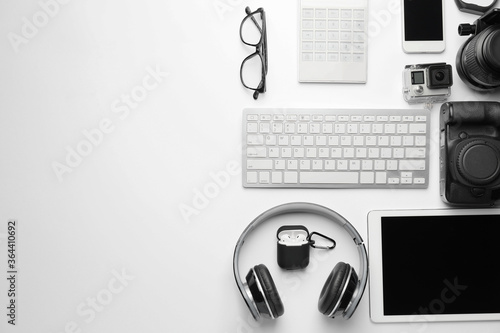 Different modern devices on white background photo