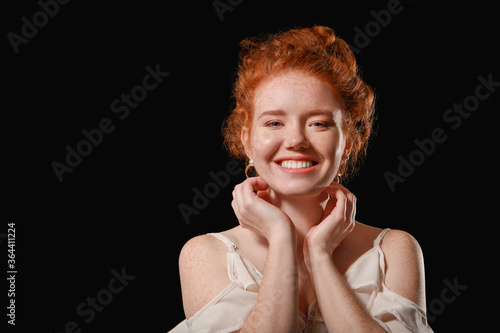 Portrait of beautiful redhe...