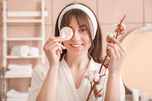 Beautiful young woman with ...